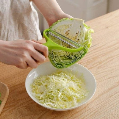 epluche-legume-plastique-vert