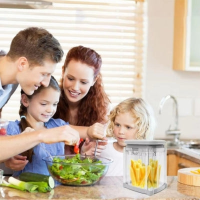 coupe-legume-en-cube-famille-l-utilisant
