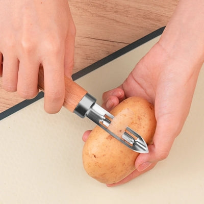 econome-epluchant-pomme-de-terre