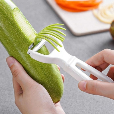 epluche-legume-blanc-pratique