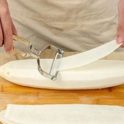 epluche-legume-poignee-en-v