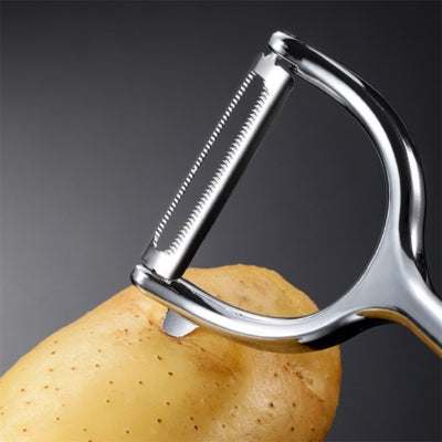 epluche-legumes-parant-pomme-de-terres