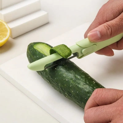 epluche-legumes-vert-epluchant-concombre