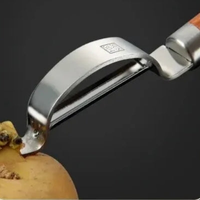 epluche-legumes-parant-tomate