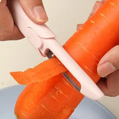 epluche-legumes-rose-epluchant-carotte
