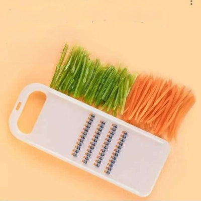mandoline-cuisine-blanche-carotte-coupee