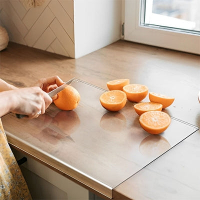 planche-a-decouper-orange-coupee