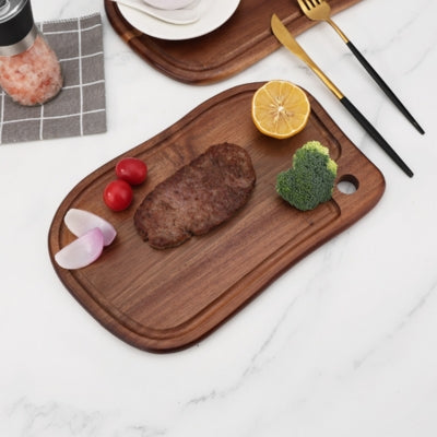 planche-a-decouper-en-bois-fruit-coupe