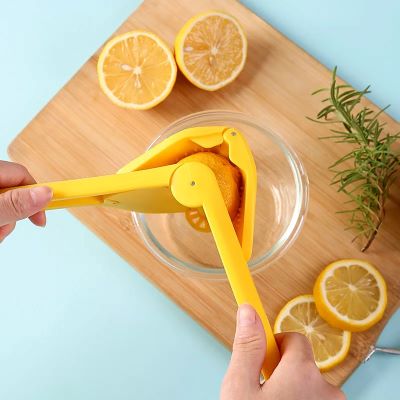 presse-agrumes-jaune-pliable