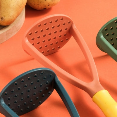 presse-puree-trois-couleurs-zoom-sur-trous
